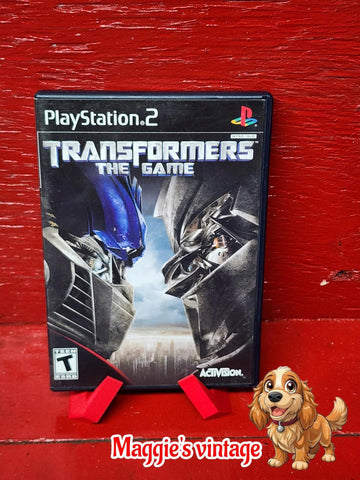 Transformers: The Game (Sony PlayStation 2, 2007)  *CIB DISC LIKE NEW*