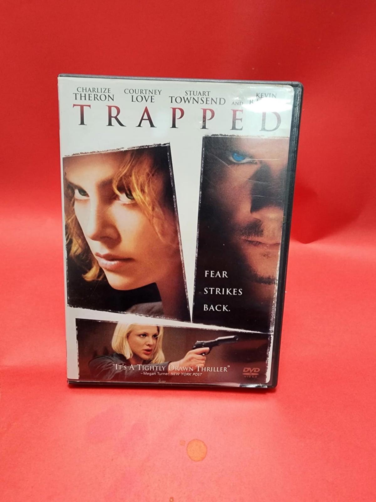 Trapped / piégés - DVD bilingual - Charlize Theron, Courtney Love