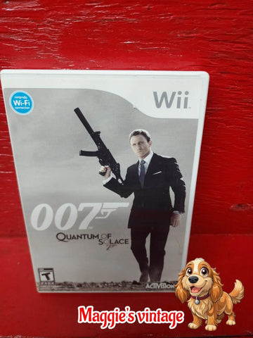 007 Quantum of Solace (Nintendo Wii, 2008)  with Manual *DISC LIKE NEW*